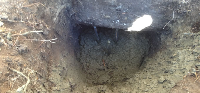 Exterior concrete slab foundation repair process photo 12 in Corpus Christi, Texas