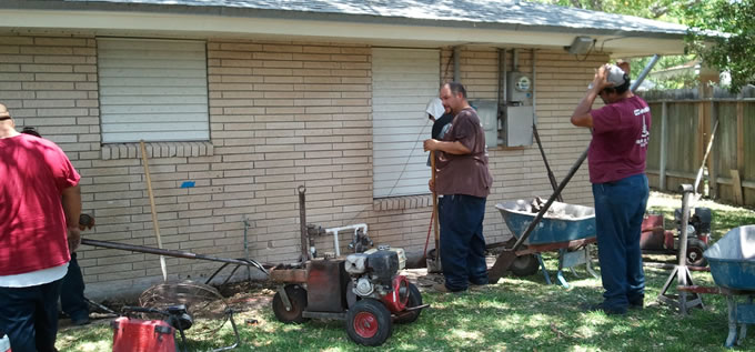 Exterior concrete slab foundation repair process photo 4 in Corpus Christi, Texas