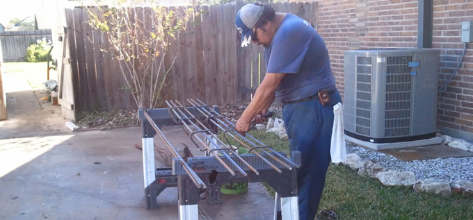 Exterior concrete slab foundation repair process photo 5 in Corpus Christi, Texas