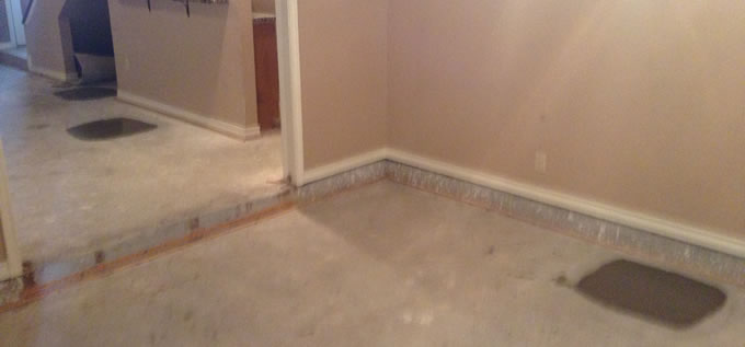 Interior concrete slab foundation repair process photo 3 in Corpus Christi, Texas