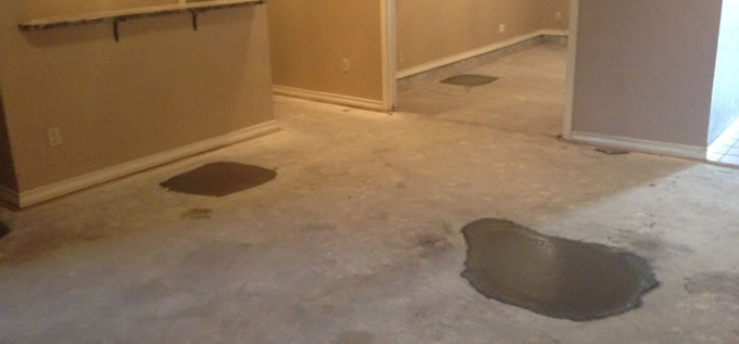 Interior concrete slab foundation repair process photo 5 in Corpus Christi, Texas